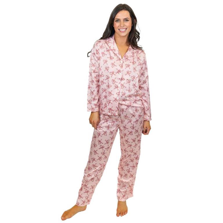 two piece button up pink satin pajama set with long-sleeve button-up top and pants and small red candy canes and bows.