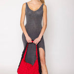 red bag with black sides quilted puffer bag