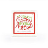 A festive, white, red and green, soap-infused sponge, with a whimsical label that reads "Merry Christmas Ya Filthy Animal."