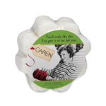 A soap-infused sponge with a label that reads "You'll Really Like This Gift. You gave it to me last year."