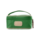 A kelly green colored Jon Hart mini makeup case with natural leather trim and a leather patch for personalization.