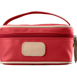 A red colored Jon Hart mini makeup case with natural leather trim and a leather patch for personalization.