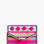 A multicolored geometric-patterned jewelry case with a snap envelope closure and decorative tassel details.