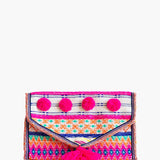 A multicolored geometric-patterned jewelry case with a snap envelope closure and decorative tassel details.