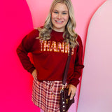 Plaid fall skort with built-in shorts, drawstring waist, and side pockets