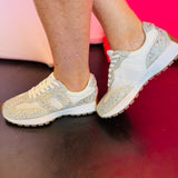Detailed view of Corky's rhinestone-covered mesh sneakers showing sparkle and lace-up closure.