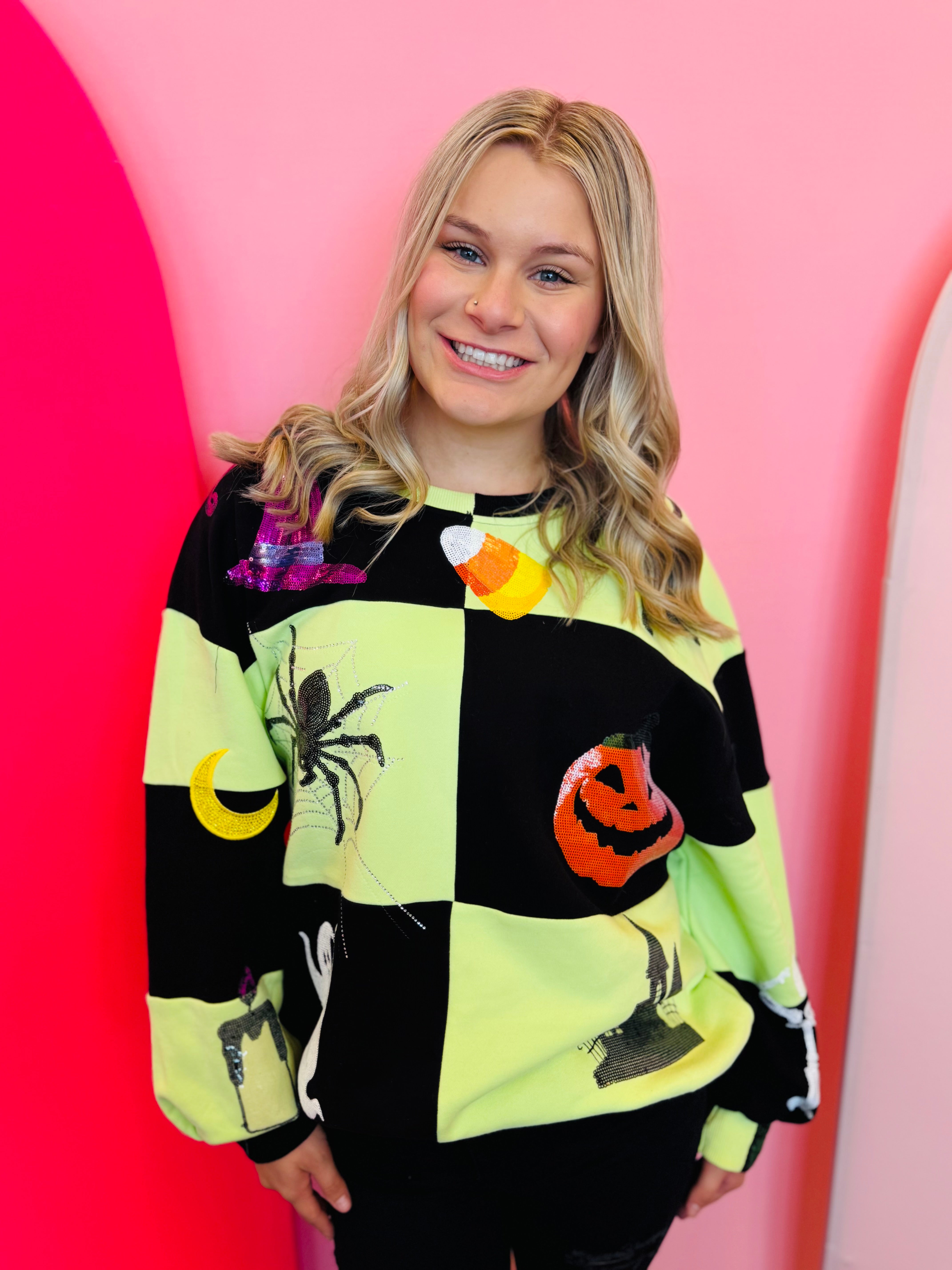 Green and black checkered Halloween sweatshirt with rhinestone and sequin Halloween motif.