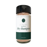 A bottle of Rowe Casa dry shampoo, 2 oz size