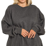 Acid washed oversized black sweatshirt with neck overlay.