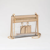 Clear crossbody bag with shimmering gold trim and matching hardware, featuring a detachable sunglasses holder—elegant and event-ready.