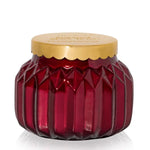 An 8oz Capri Blue Sugared Spice Twist Royal Gem Petite Candle in a decorative jar.