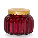 An 8oz Capri Blue Sugared Spice Twist Royal Gem Petite Candle in a decorative jar.