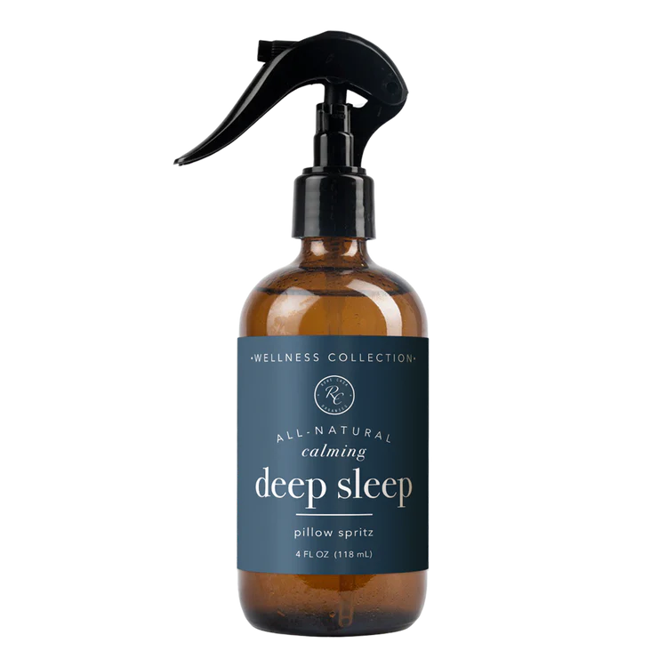 A bottle of Rowe Casa Deep Sleep Pillow Spritz with a spray nozzle, labeled for calming and relaxation.