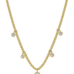 Gold beaded necklace with graduated crystal circle charms, water-resistant, adjustable 16"-18".