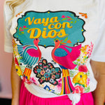 Detailed close-up of the tee’s design showing the vivid flowers and shimmering rhinestones with clear texture and shine.