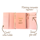 Inside view of pink magnetic closure journal folio and calendar with gold graphics.