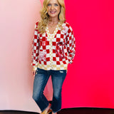Queen of Sparkles checkered sequin and rhinestone game day cardigan.