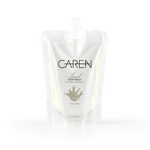 An 8oz biodegradable pouch of "Loved" body wash.
