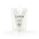 An 8oz biodegradable pouch of "Loved" body wash.