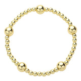 Waterproof stainless steel 4mm gold beaded bracelet with 8mm gold bead accent.