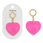 Pink 1.5-inch heart charm for scarf necklaces with a vibrant color-coated finish.