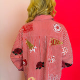 Back side of Queen Of Sparkles crimson red and white stripe icon University Of Oklahoma game day blouse.