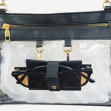 Clear crossbody bag with black trim and gold hardware, featuring a detachable sunglasses holder—fun and functional for any event.