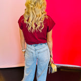 Back view of the jeans showing traditional back pockets and a contoured fit that enhances the silhouette.