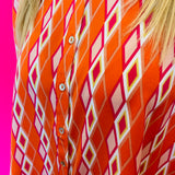 Tangerine Print Dolman Sleeve Top