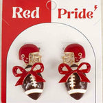 Red and gold 1.75-inch dangle earrings with bow and football design.