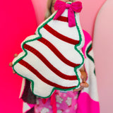 Pink bow Christmas treat pillow for festive home decor.