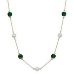 Beiber Emerald Pearl Necklace, 16–18 in gold chain with alternating emerald green crystals and pearls.