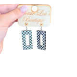 Sparkle black and white checkered rectangular earrings with bold cutout design