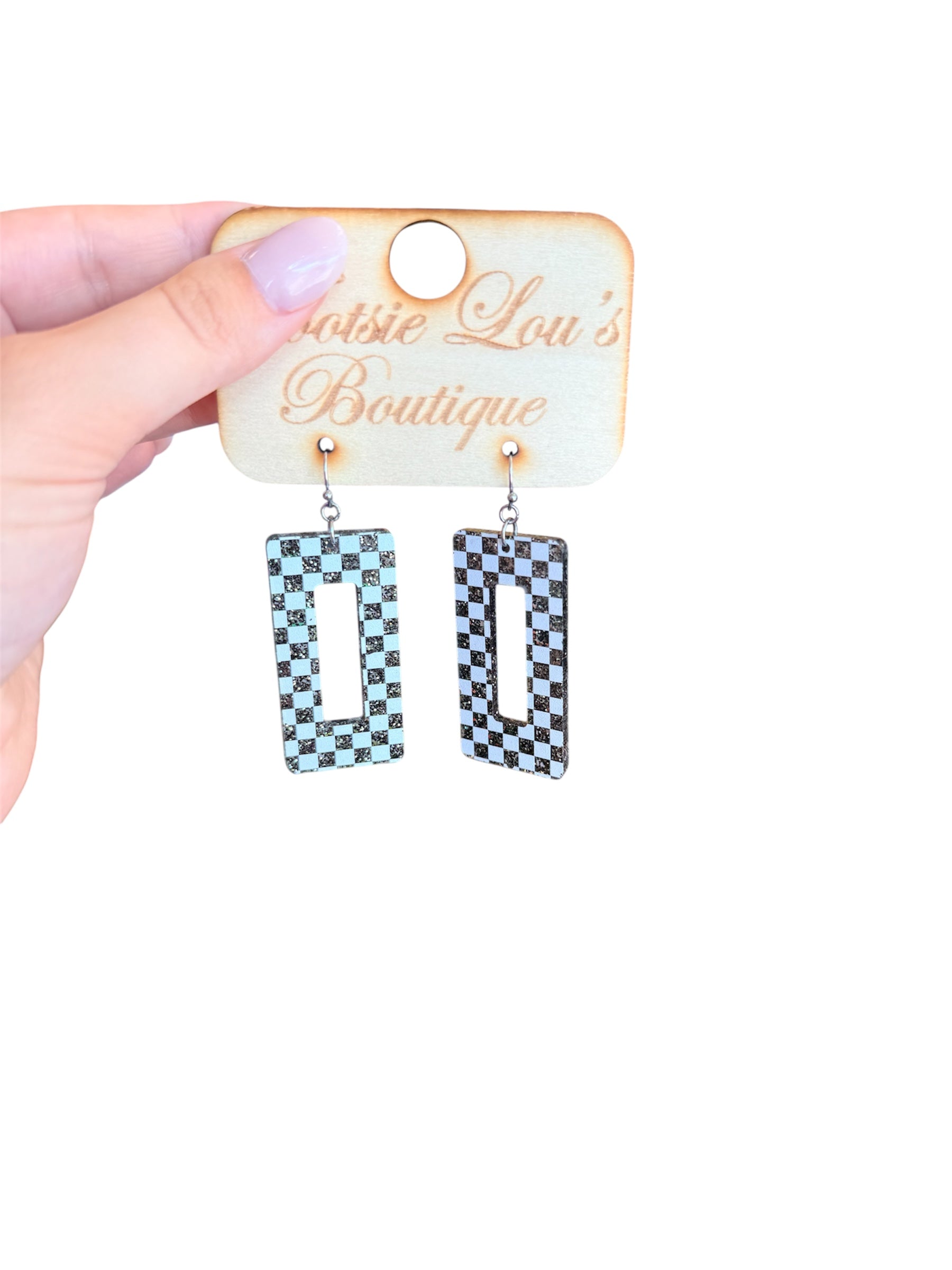 Sparkle black and white checkered rectangular earrings with bold cutout design