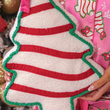 Pink bow Christmas treat pillow for festive home decor.
