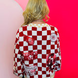 Back side of Queen of Sparkles checkered sequin and rhinestone game day cardigan.