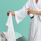 Capri Blue Volcano Wrinkle Release Spray bottle for refreshing fabrics with tropical citrus fragrance