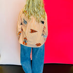 Back side of Queen Of Sparkles orange and white striped icon Oklahoma State University game day blouse.