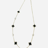 Bara Boheme black clover necklace in gold.