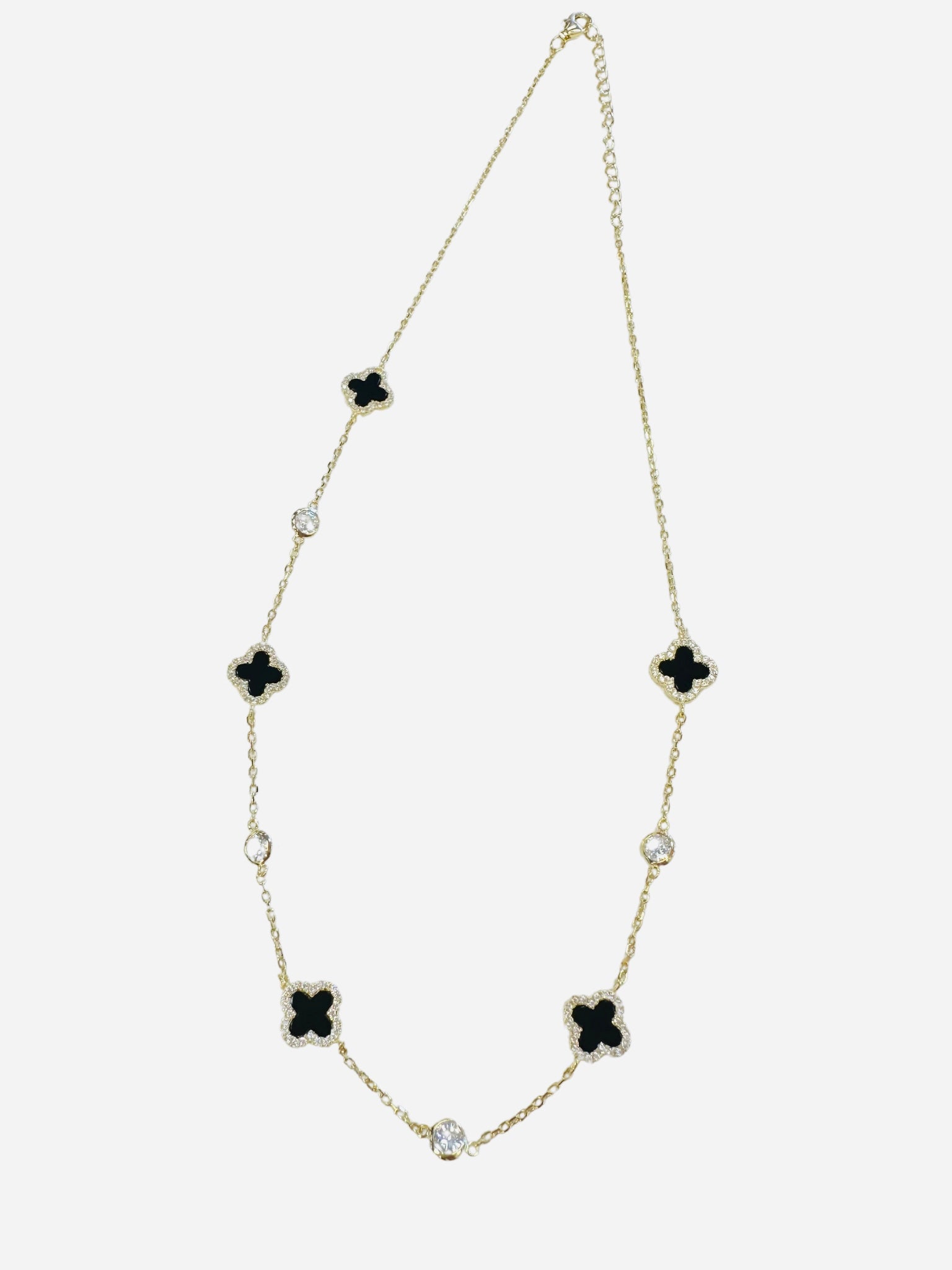 Bara Boheme black clover necklace in gold.