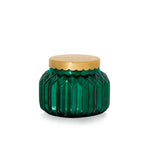 Capri Blue - 19oz Volcano Royal Gem Signature Candle in a faceted emerald green jar with a gold lid.