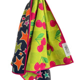 Crae Cherry Burst reversible hand towel, 19x29 in, cherry print front and colorful star design back.