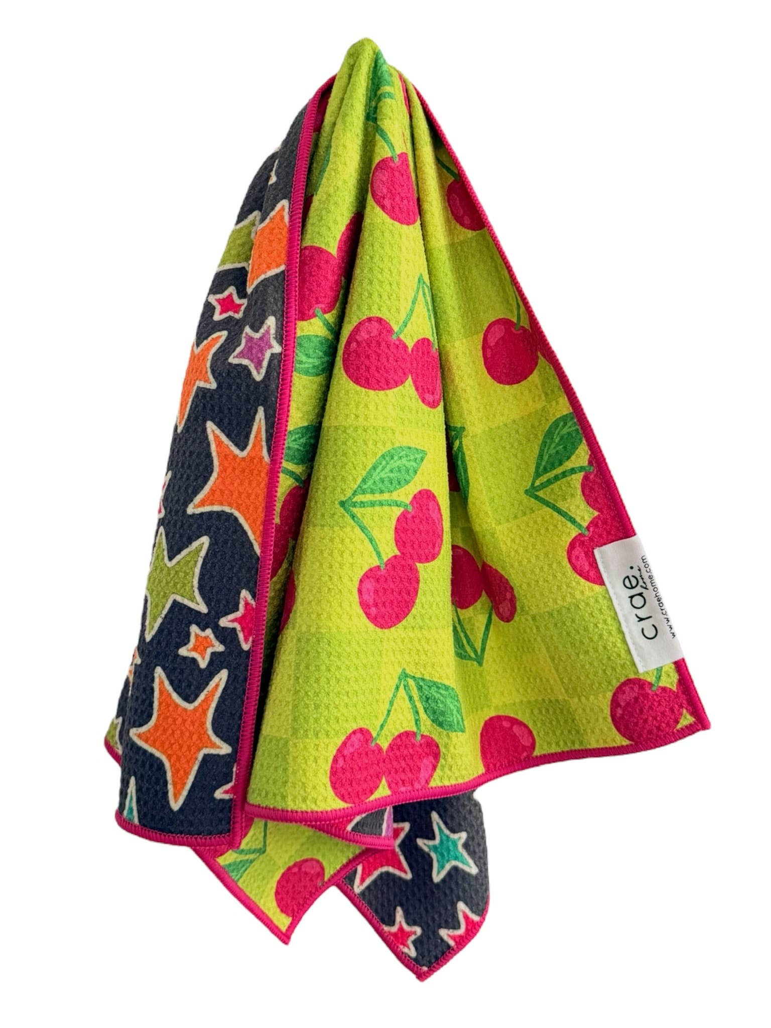 Crae Cherry Burst reversible hand towel, 19x29 in, cherry print front and colorful star design back.