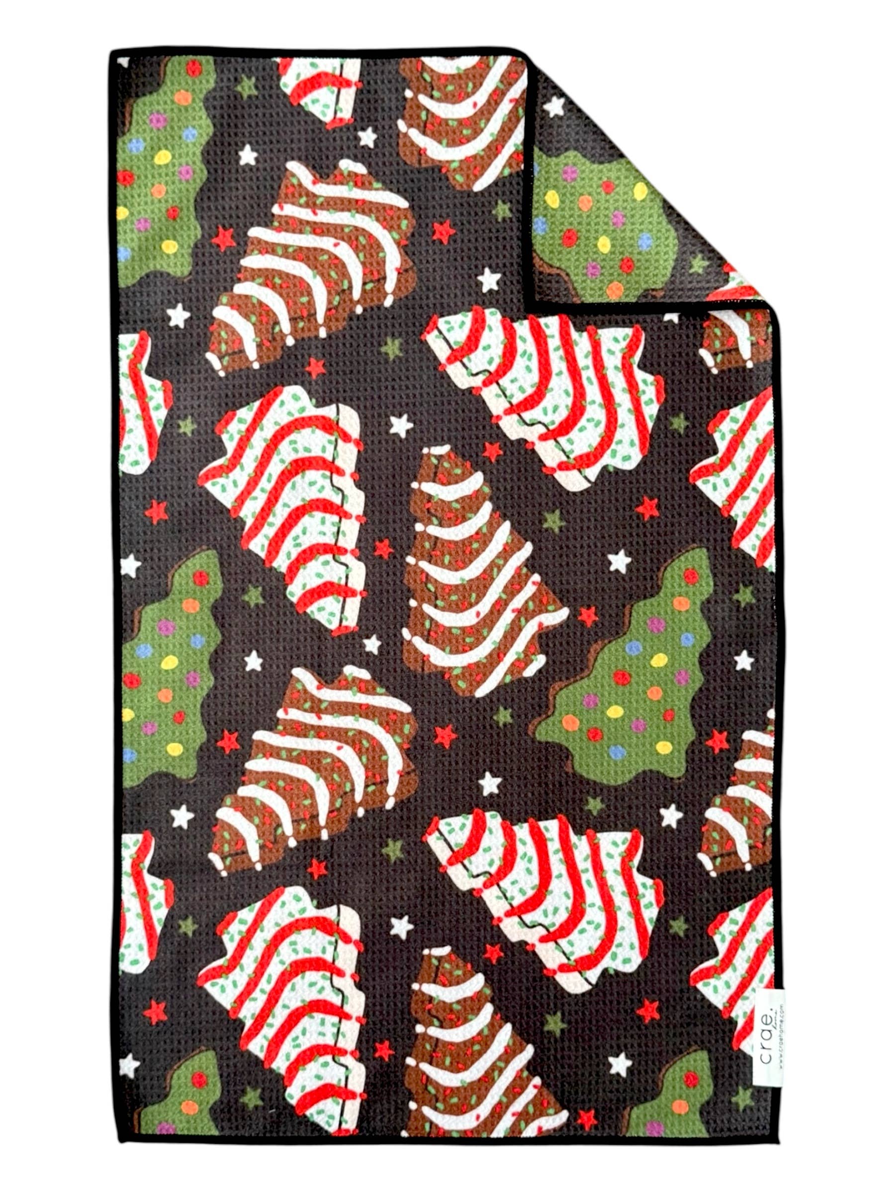 Crae Debs microfiber hand towel, 17x27 in, black with festive Christmas Debbie treats and sprinkles.