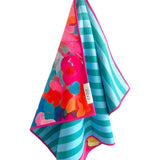 Reversible microfiber hand towel with turquoise stripes, floral pattern, and bright pink trim, 19x29 inches.
