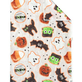 Crae Monster Munchies microfiber hand towel, 17x27 in, white with Halloween pumpkins, ghosts, bats, and candy corn.