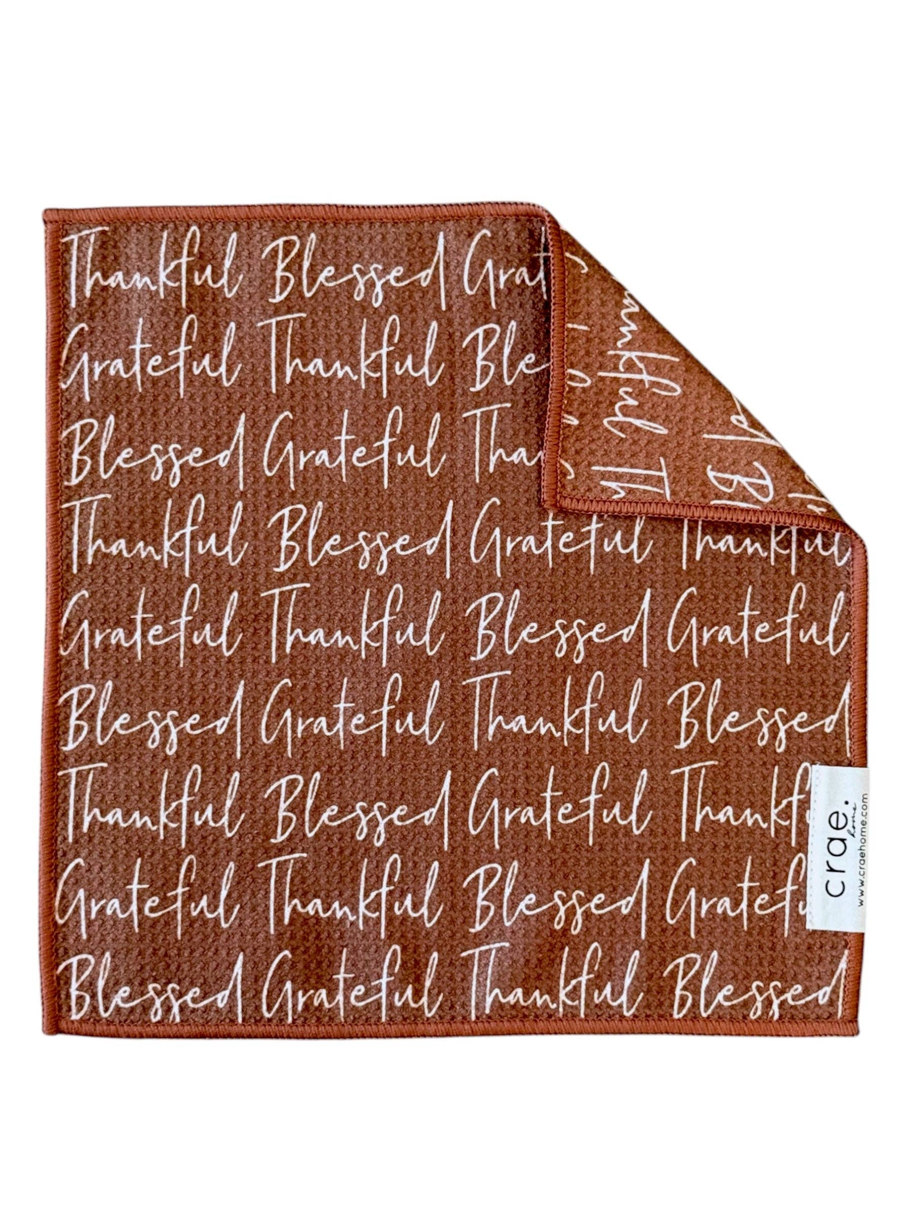 Crae Thankful microfiber washcloth, 12x12 in, brown with cream “Thankful, Grateful, Blessed” lettering.