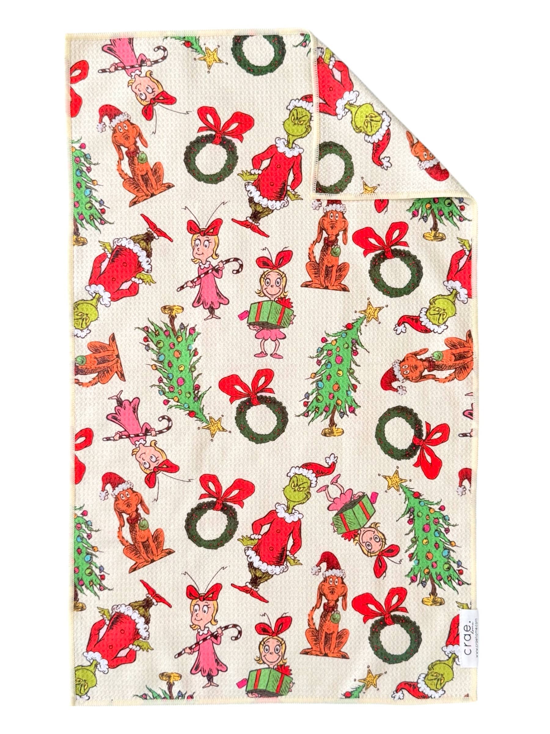 Crae Whoville microfiber hand towel, 17x27 in, cream with Grinch-inspired holiday print and festive accents.