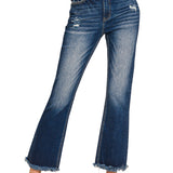 Close view of high-rise cropped denim showcasing raw hem and subtle distressed details