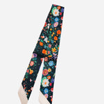 Black floral scarf necklace with rich, elegant tones and soft, lightweight fabric design